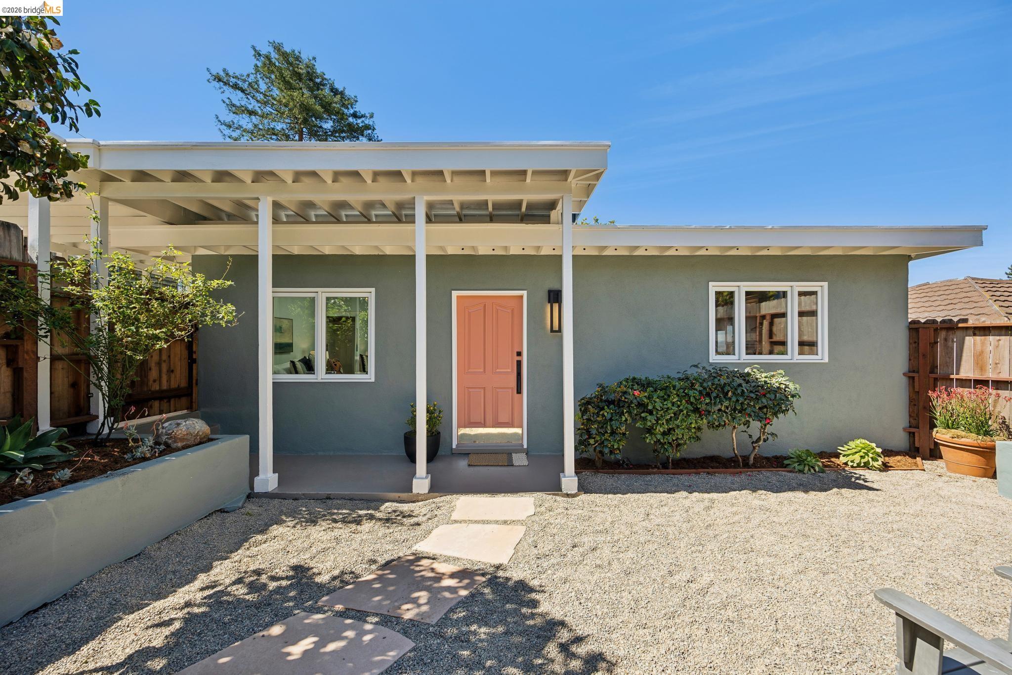 2924 Shasta Road Berkeley, CA 94708 - Photo 2 of 38 View of front facade featuring stucco siding and a porch