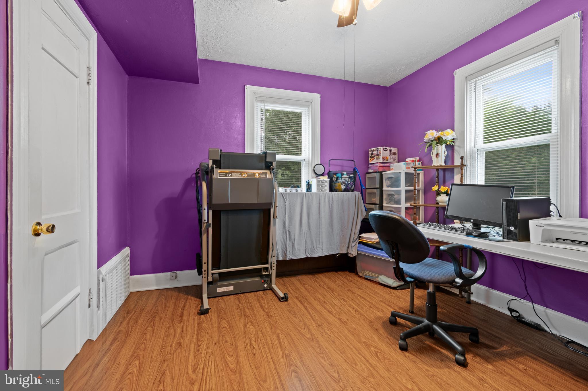 4410 Allies Road Suitland, MD 20746 - Photo 8 of 30 a view of a workspace with furniture and a window