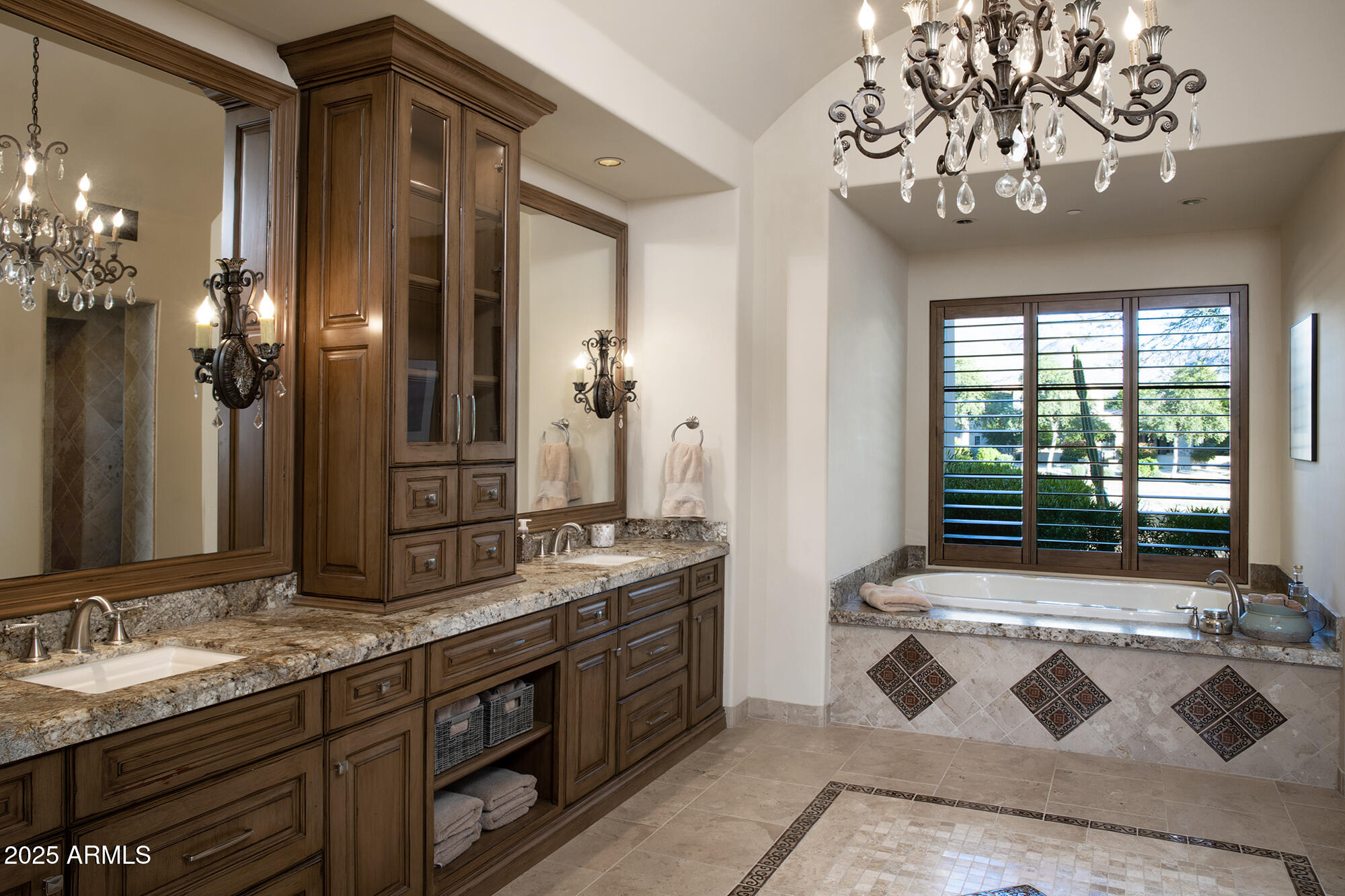 19481 North 98th Place Scottsdale, AZ 85255 - Photo 23 of 34 a bathroom with a granite countertop sink a large mirror and a shower