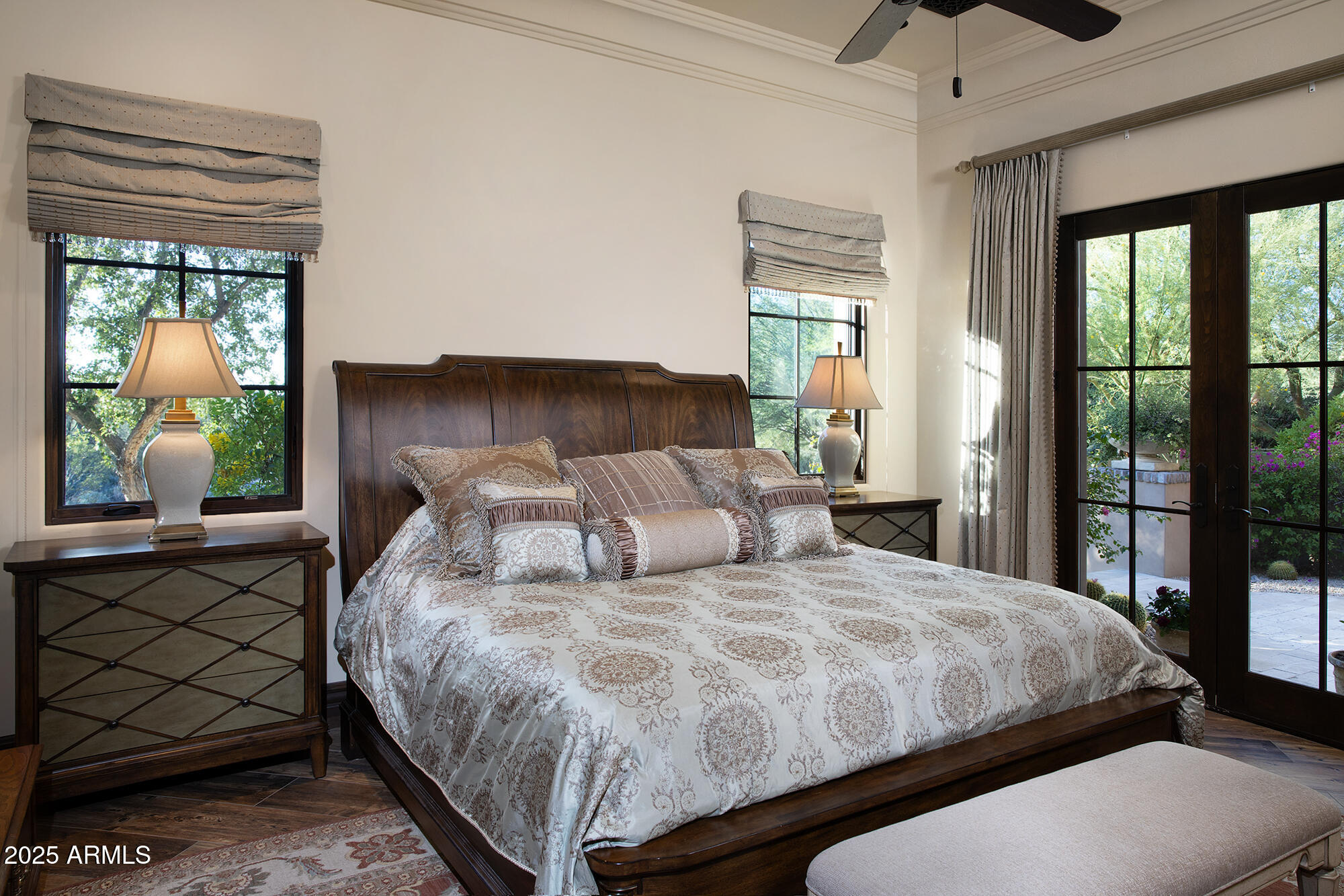 19481 North 98th Place Scottsdale, AZ 85255 - Photo 28 of 34 a bedroom with a large bed and a window