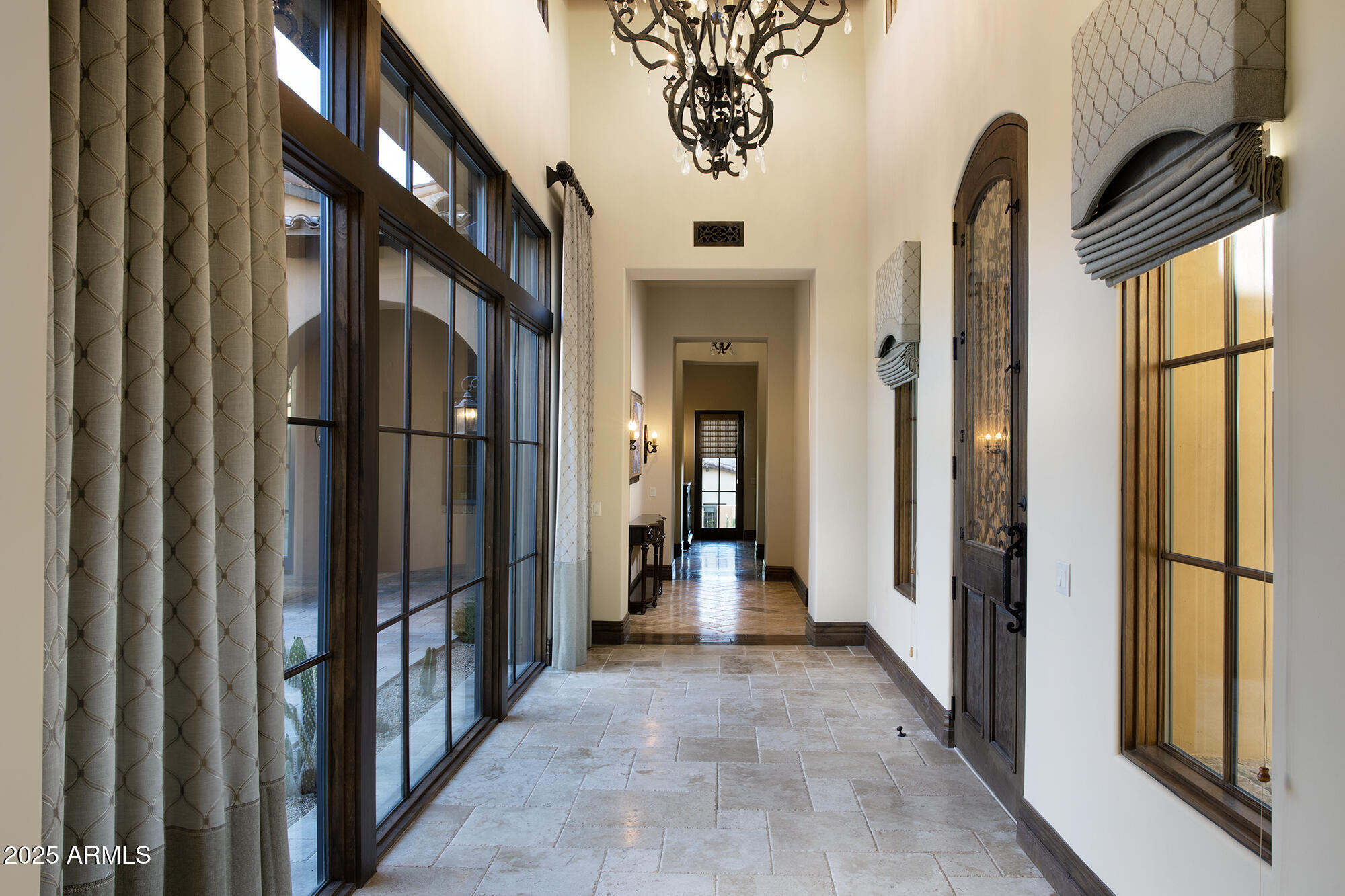 19481 North 98th Place Scottsdale, AZ 85255 - Photo 3 of 34 a view of hallway with large windows