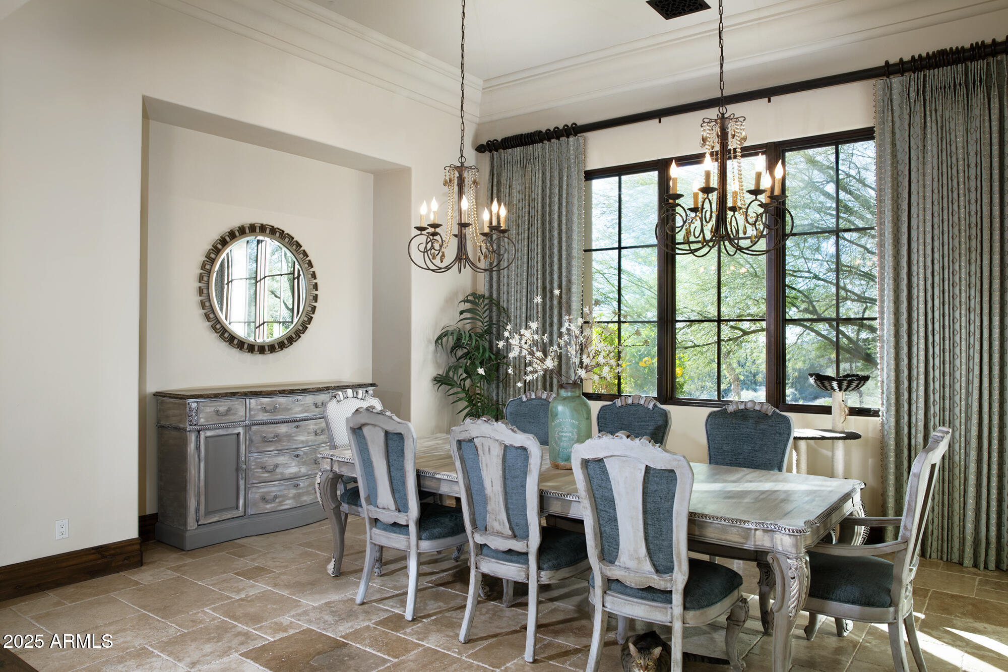 19481 North 98th Place Scottsdale, AZ 85255 - Photo 4 of 34 a view of a dining room with furniture window and outside view
