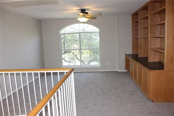 a view of stair with balcony