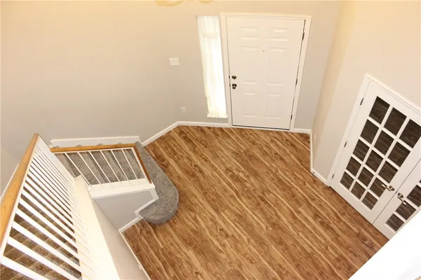 a view of house with a yard