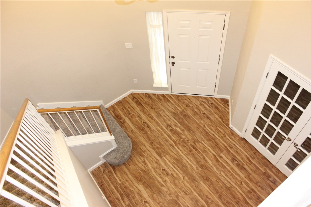 7801 Varcella Trail Austin, TX 78729 - Photo 19 of 26 a bedroom with a bed and a window