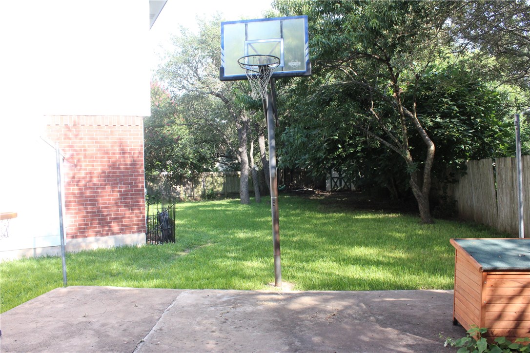 7801 Varcella Trail Austin, TX 78729 - Photo 22 of 26 a view of a back yard