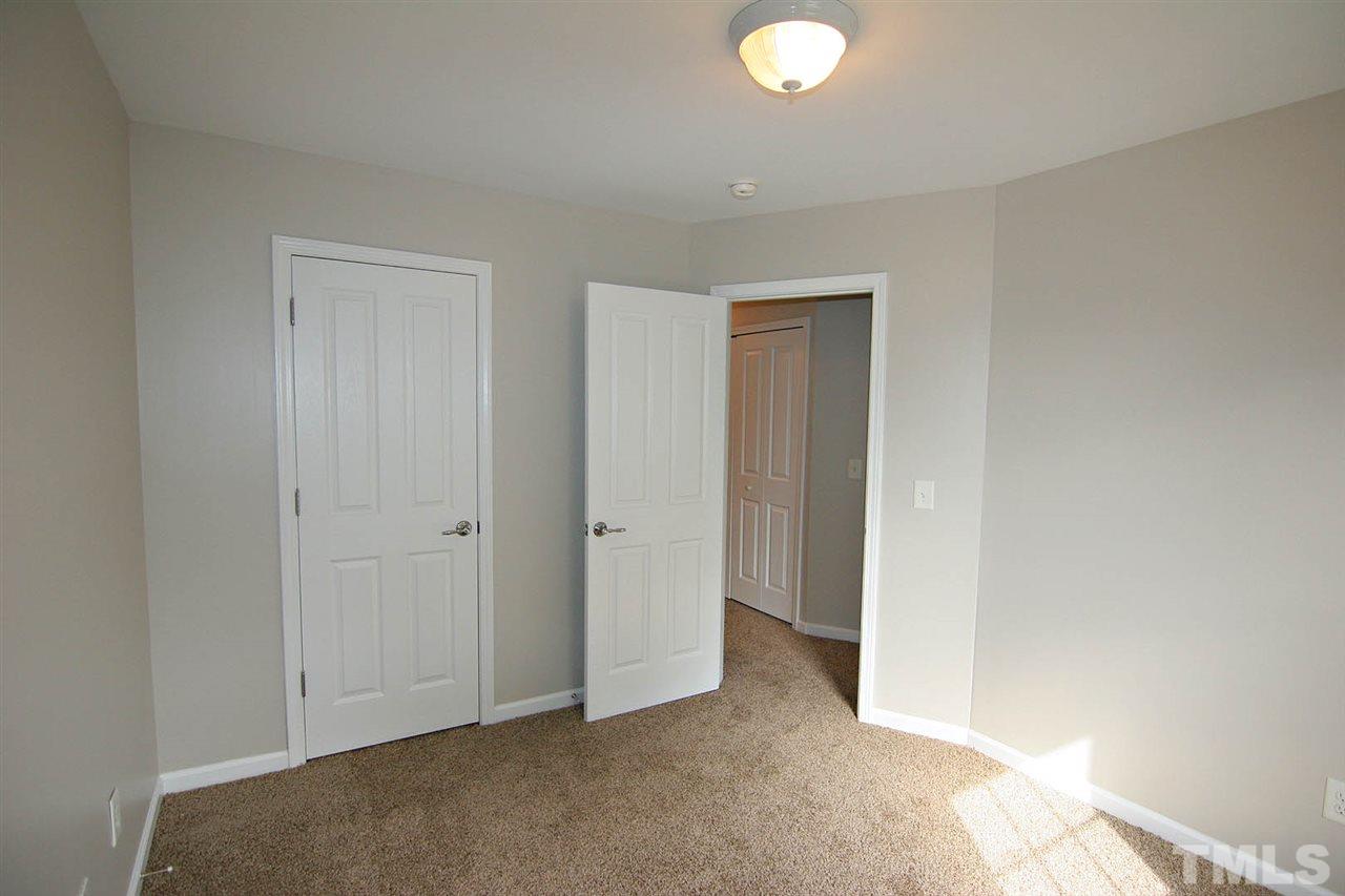 8614 Redcrest Place Raleigh, NC 27617 - Photo 14 of 16 a view of an empty room