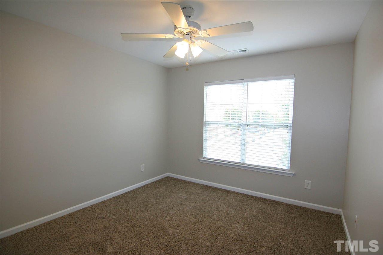 8614 Redcrest Place Raleigh, NC 27617 - Photo 15 of 16 an empty room with a window