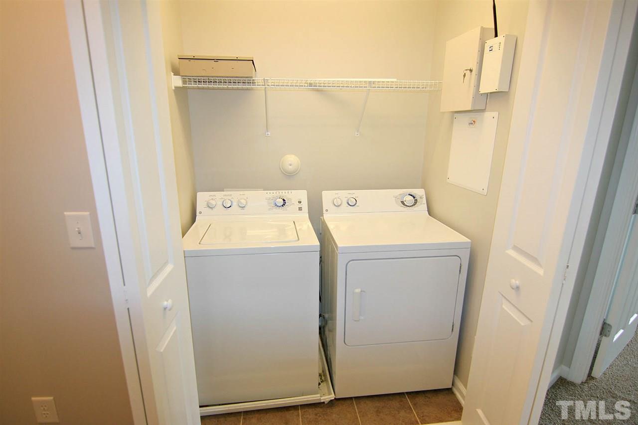 8614 Redcrest Place Raleigh, NC 27617 - Photo 16 of 16 a utility room with dryer and washer