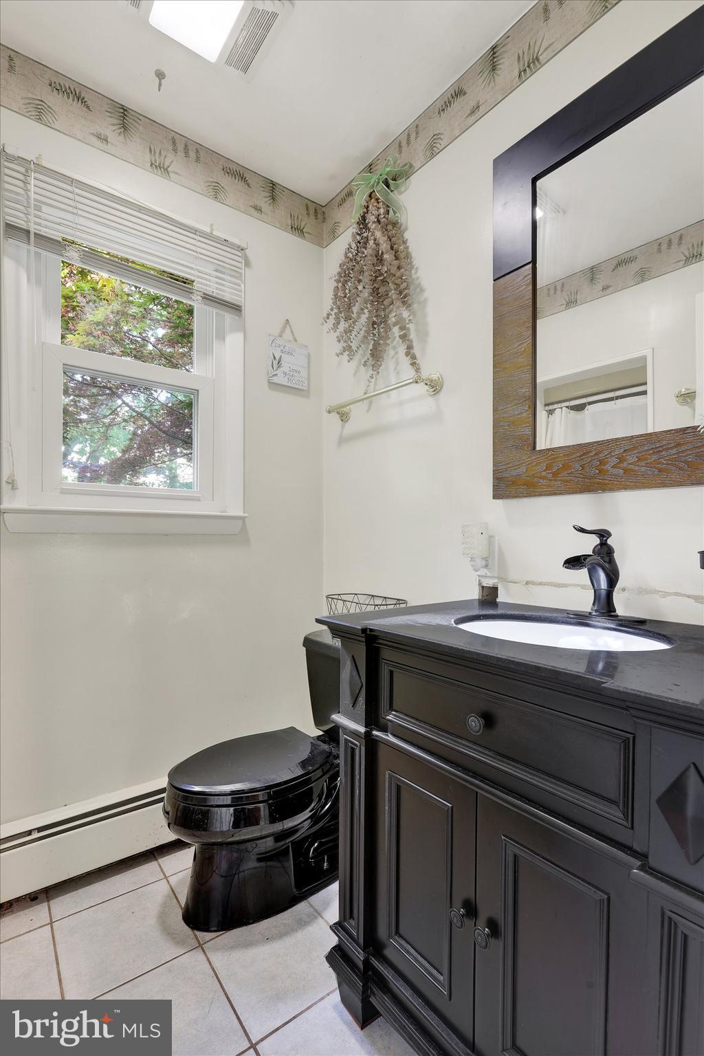620 St Johns Road Littlestown, PA 17340 - Photo 12 of 25 a bathroom with a sink and a mirror