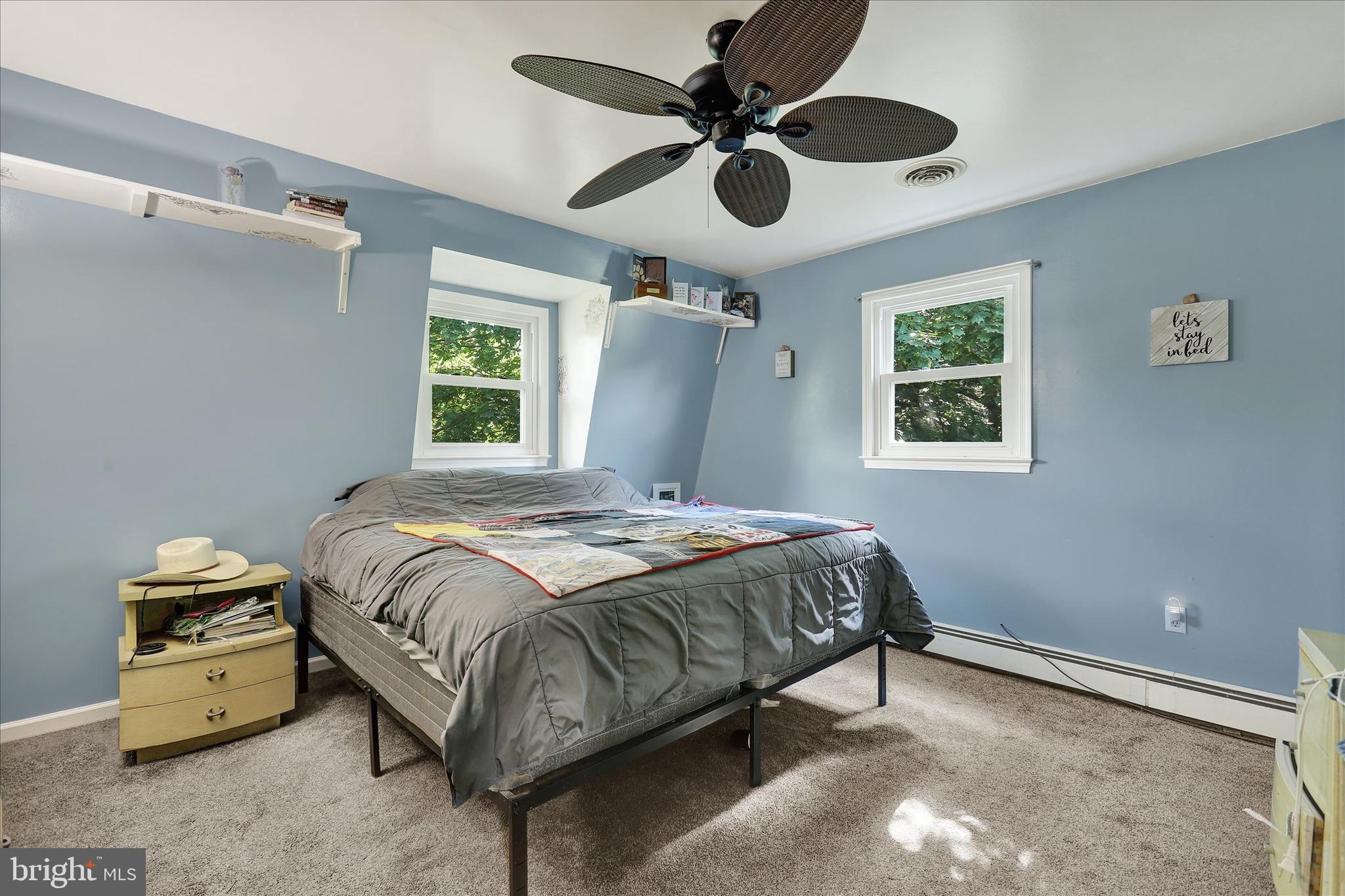 620 St Johns Road Littlestown, PA 17340 - Photo 17 of 25 a bedroom with a bed and a chandelier