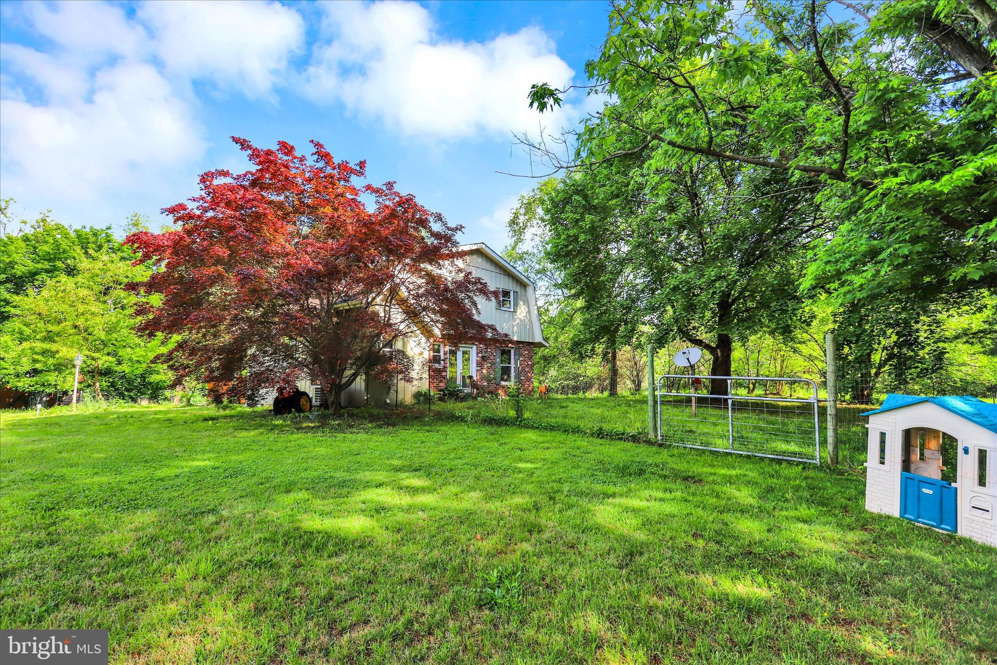 620 St Johns Road Littlestown, PA 17340 - Photo 23 of 25 a backyard of a house with lots of green space