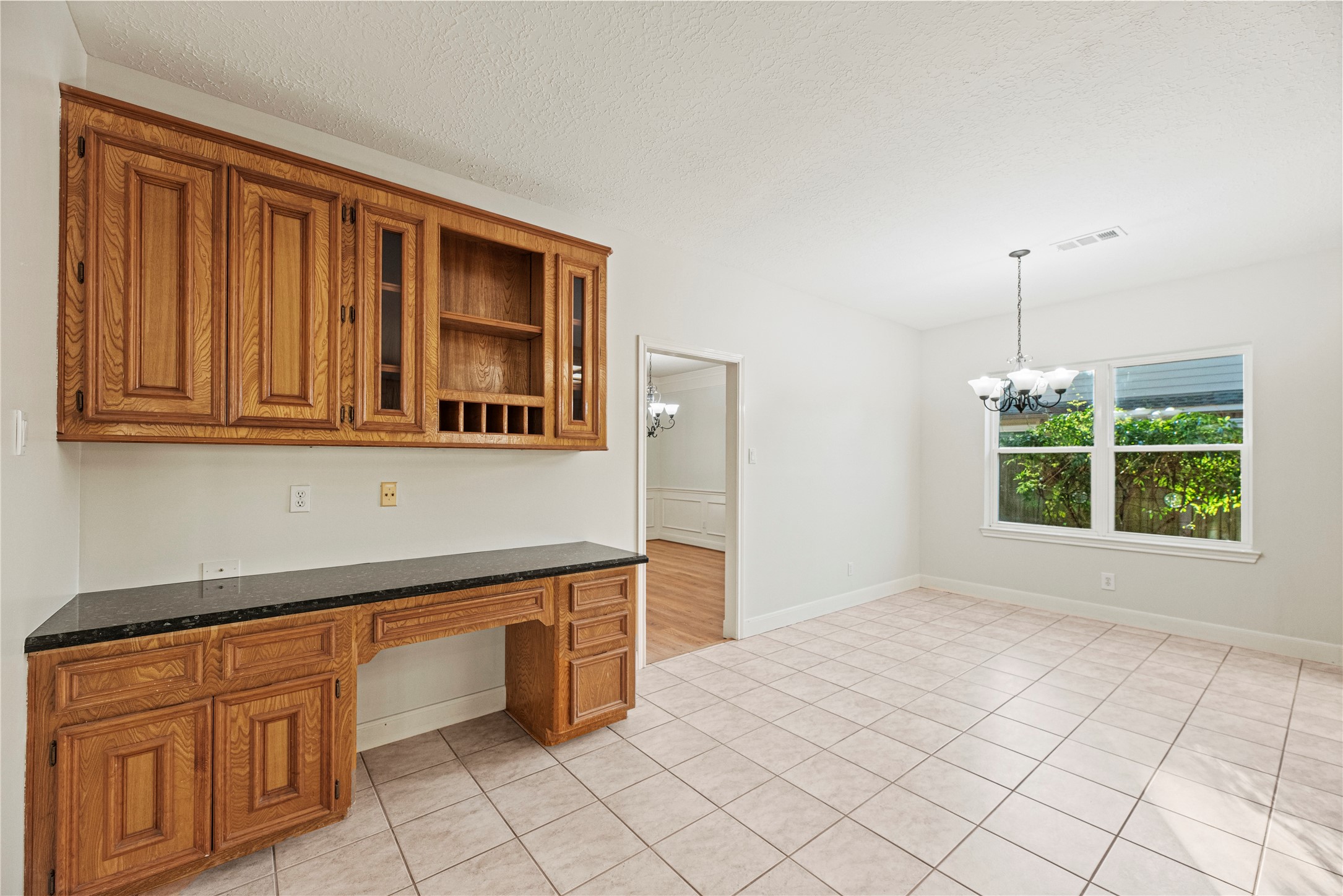 12502 Pavilion Court Tomball, TX 77377 - Photo 14 of 37 Built-in desk area in the kitchen.