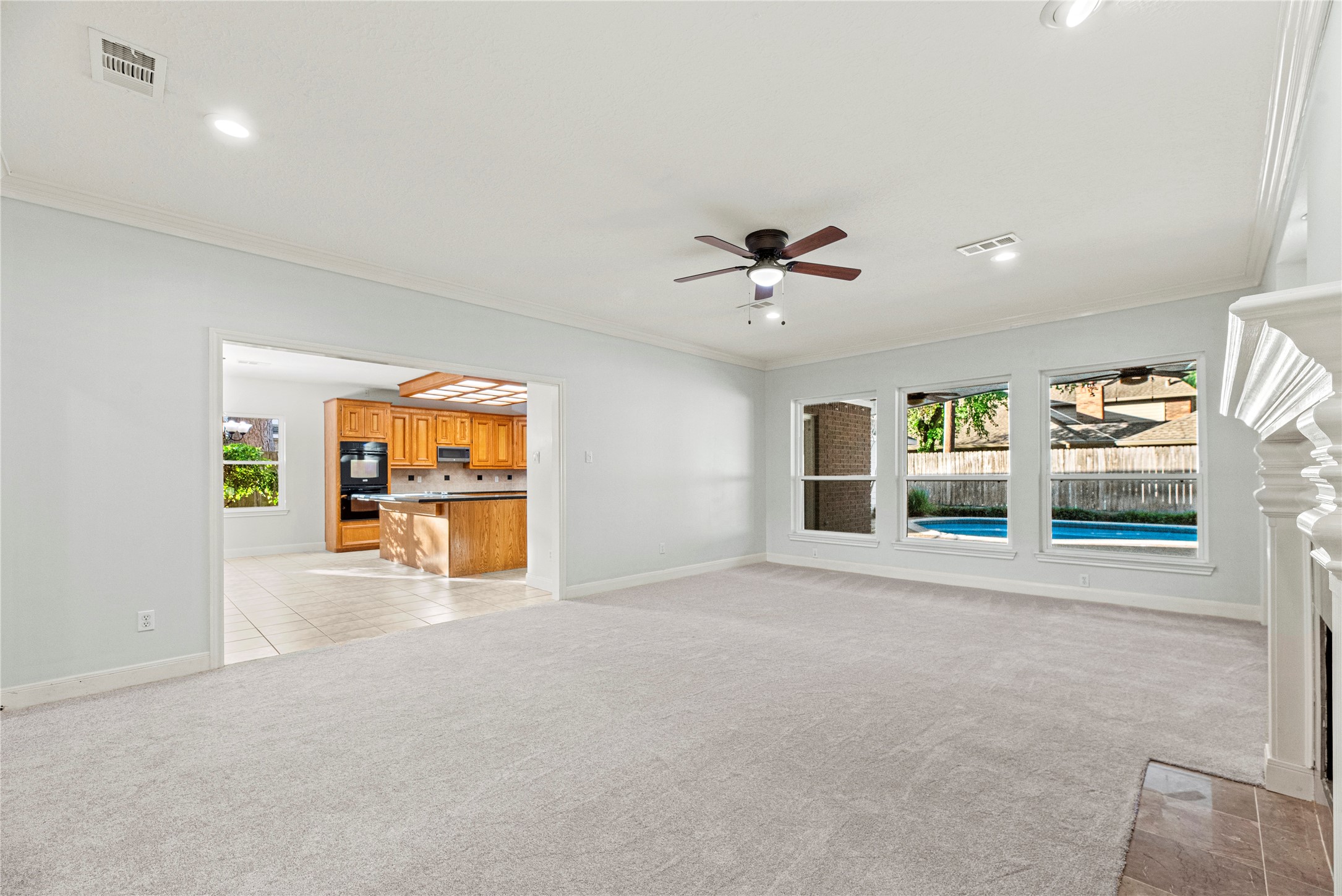 12502 Pavilion Court Tomball, TX 77377 - Photo 18 of 37 Looking from the family room into the kitchen.