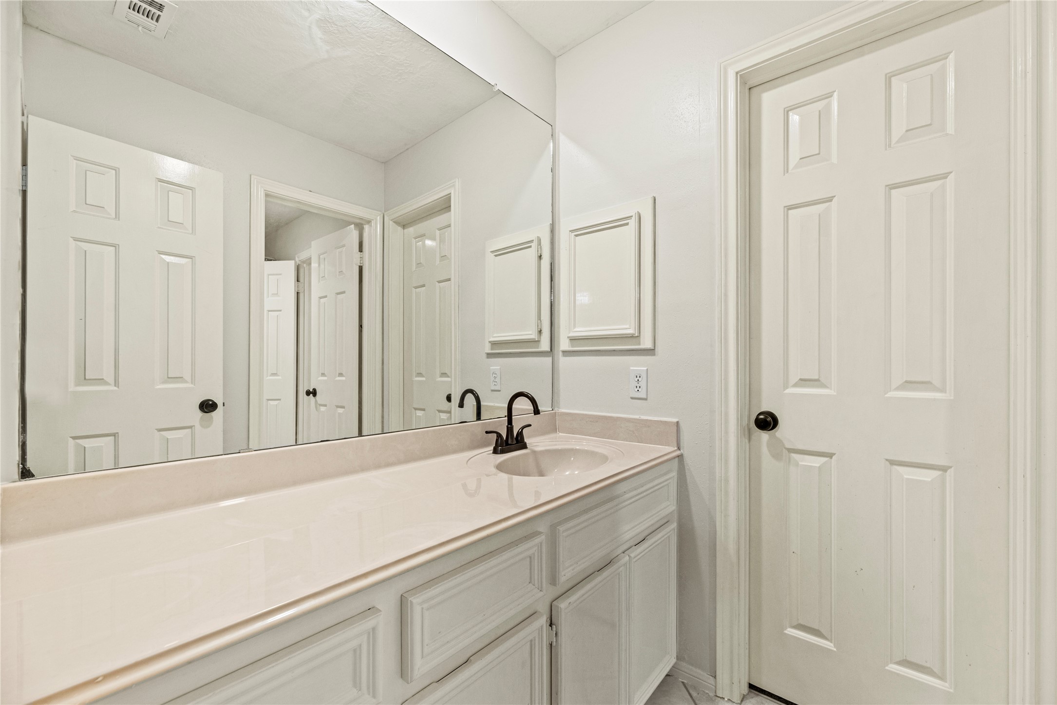 12502 Pavilion Court Tomball, TX 77377 - Photo 33 of 37 One of two vanities in the 2nd upstairs bathroom.