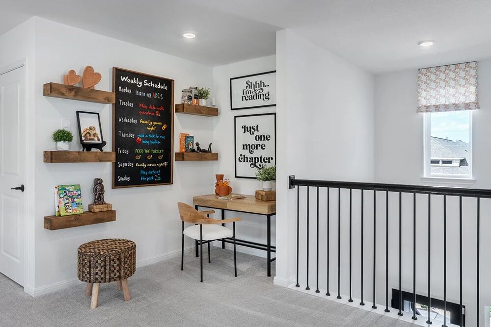 1912 Montella Way Leander, TX 78641 - Photo 12 of 31 a room with furniture a rug and a window