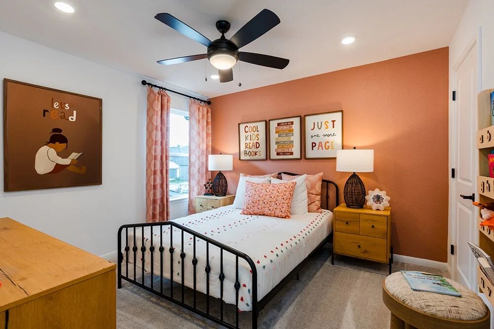 1912 Montella Way Leander, TX 78641 - Photo 14 of 31 a bed room with a bed and a painting on the wall