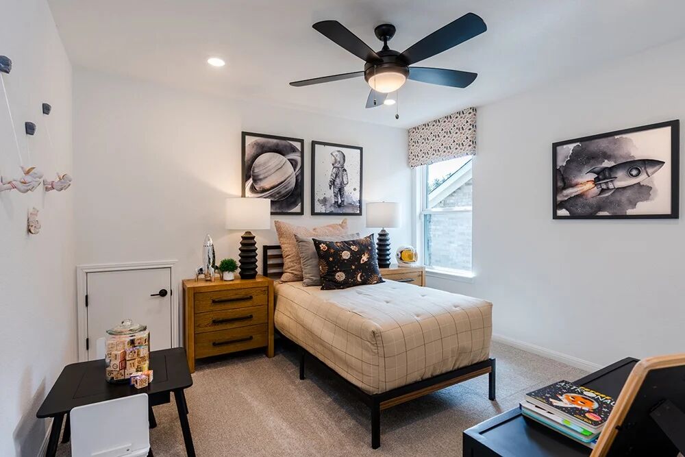 1912 Montella Way Leander, TX 78641 - Photo 15 of 31 a bedroom with furniture and a window