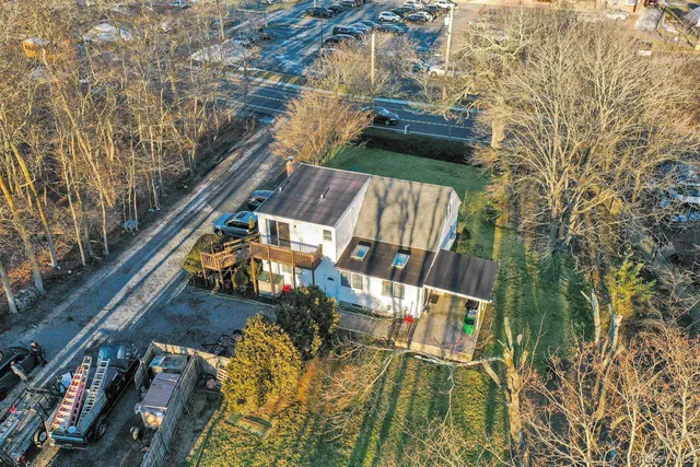 a view of balcony with wooden floor