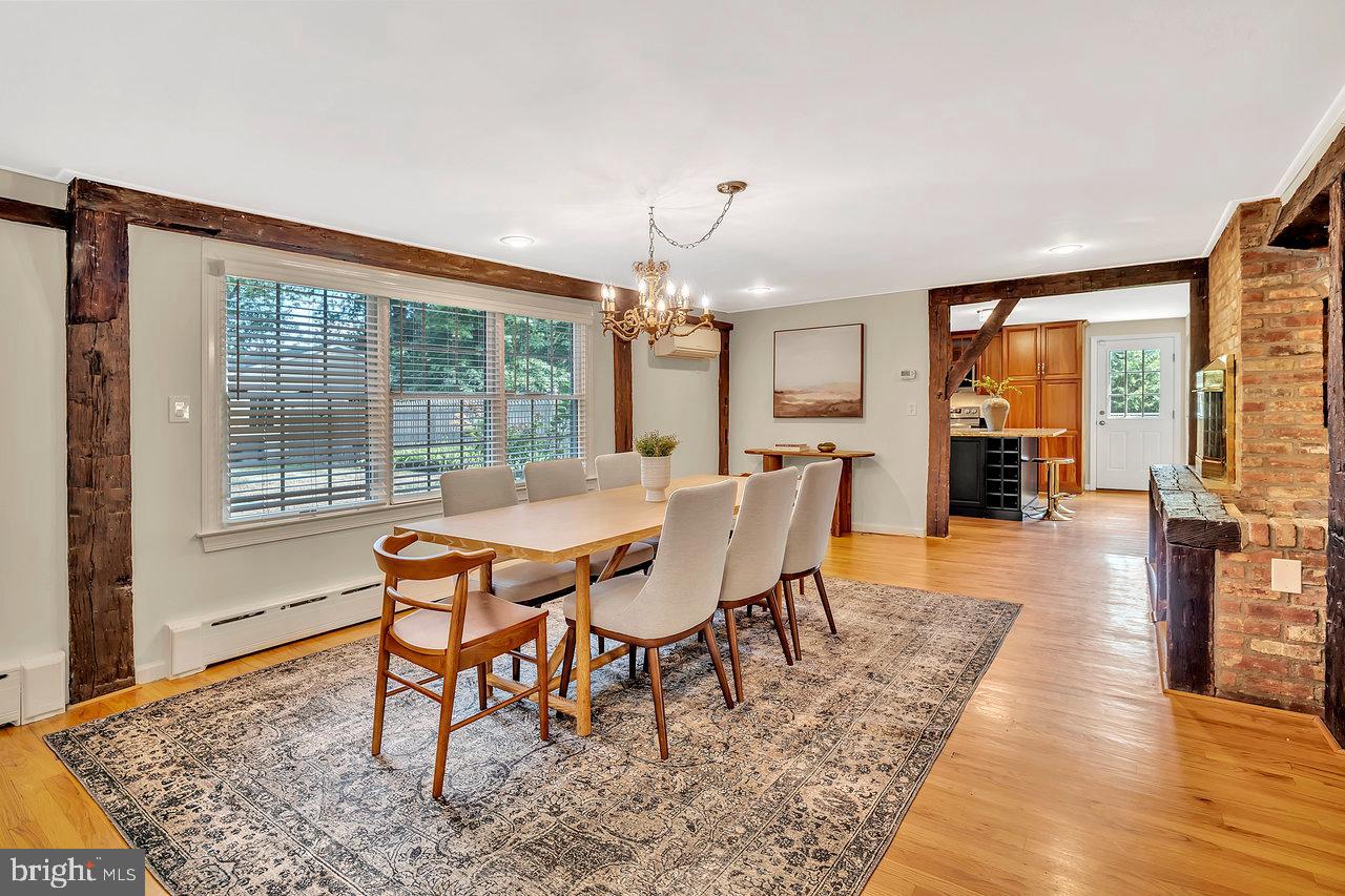 513 Cherry Valley Road Princeton, NJ 08540 - Photo 19 of 52 a dining room with furniture window and wooden floor