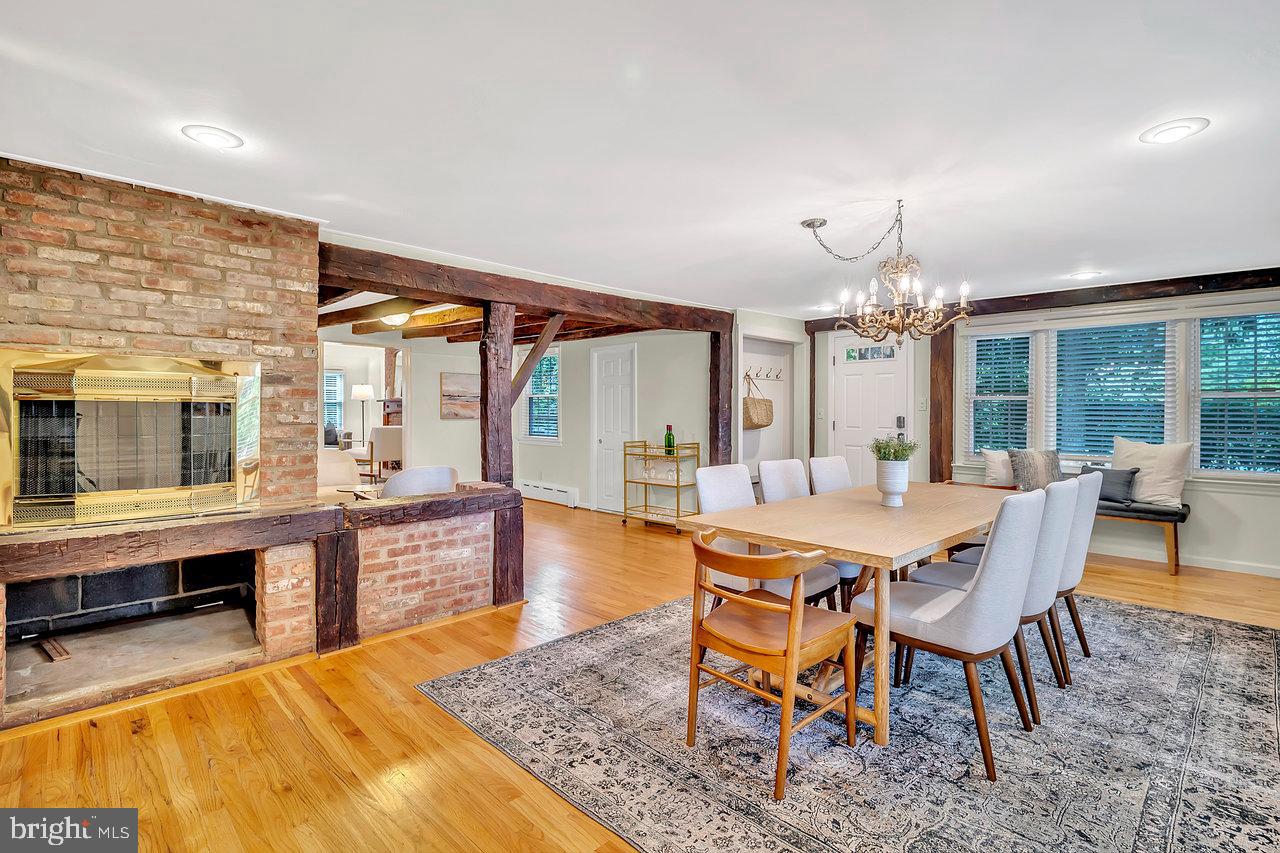 513 Cherry Valley Road Princeton, NJ 08540 - Photo 20 of 52 a view of a dining room with furniture window and wooden floor