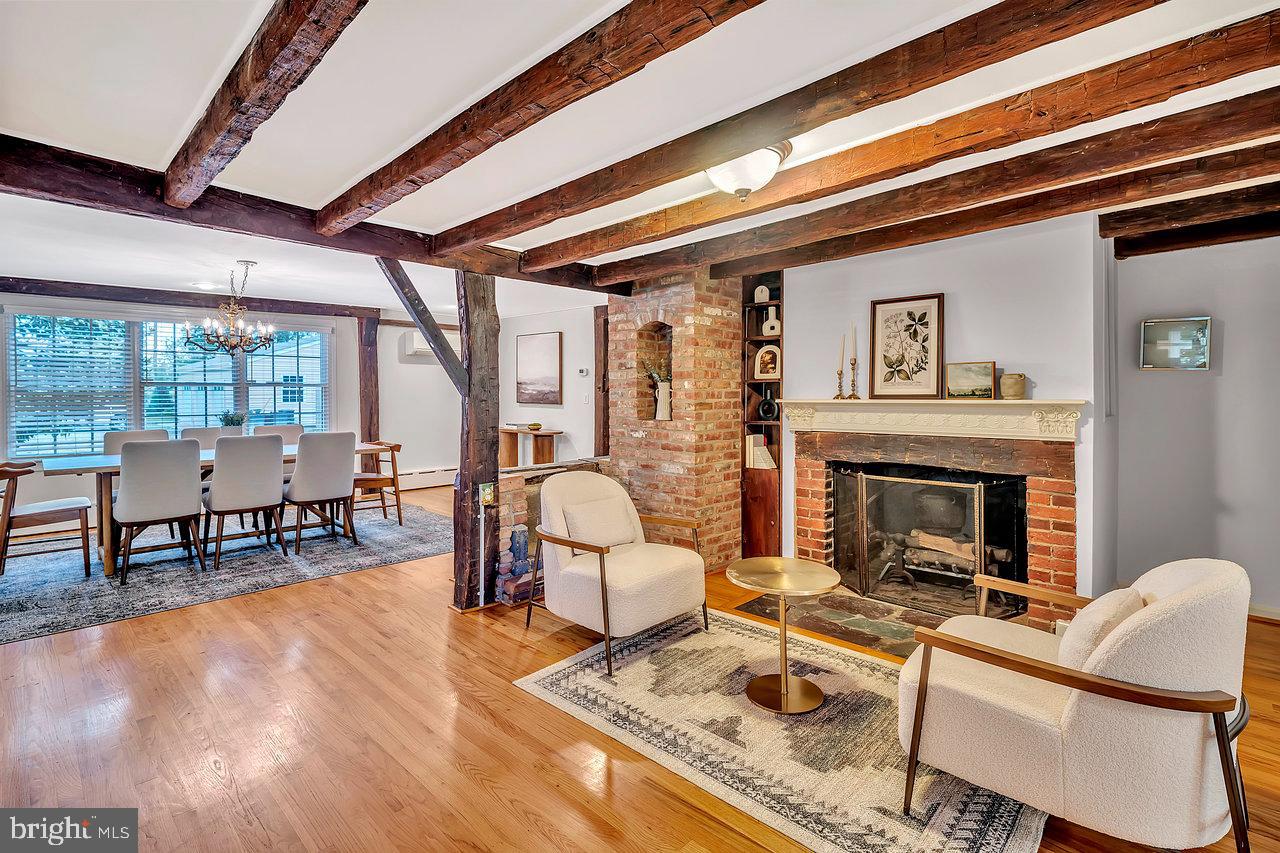 513 Cherry Valley Road Princeton, NJ 08540 - Photo 33 of 52 a living room with furniture and a fireplace