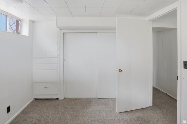 774 37th Street South Ogden, UT 84403 - Photo 20 of 47 Carpeted flooring throughout, white painted walls, and a white drop ceiling