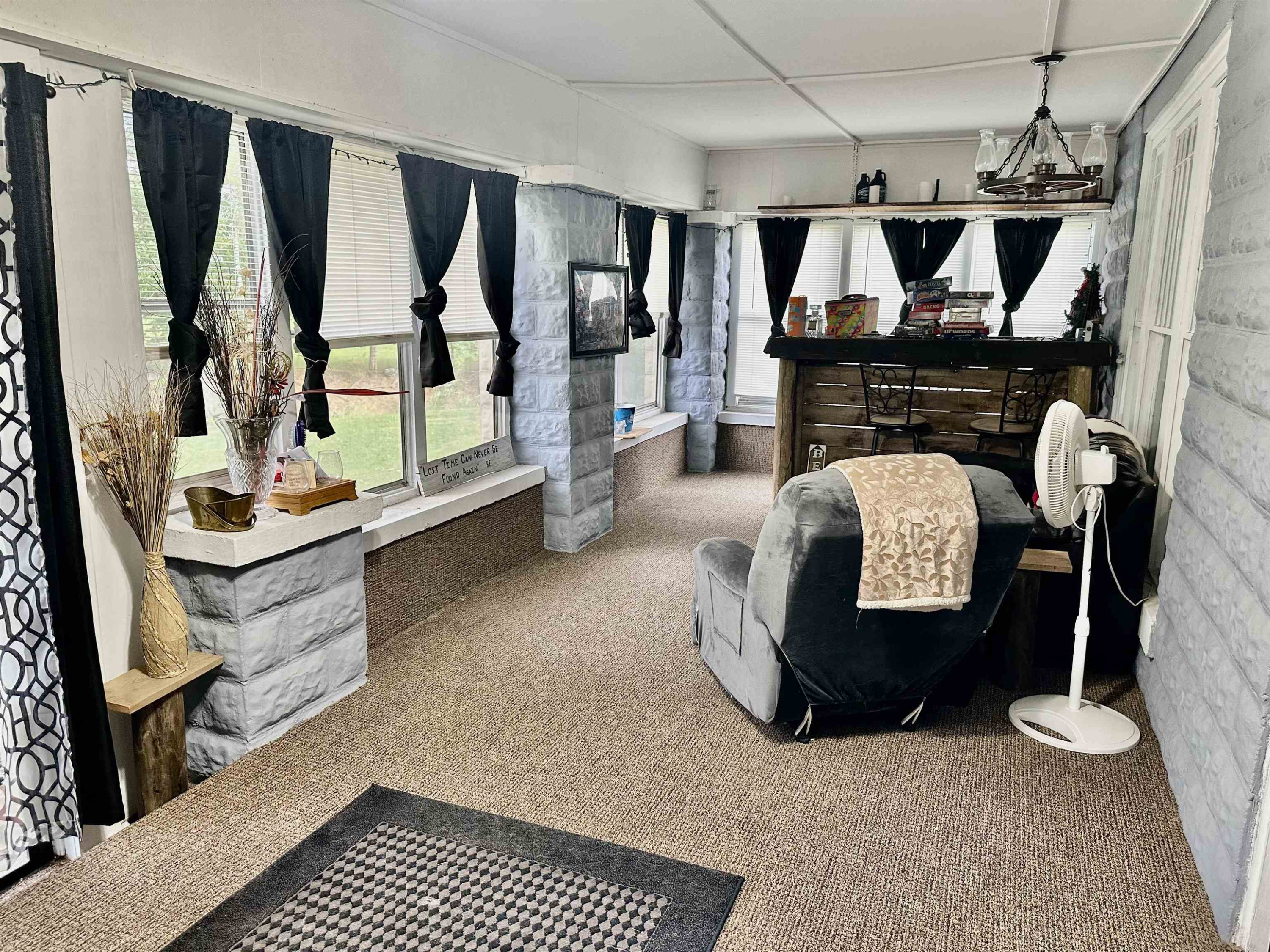 940 Lynn Point Road Greenfield, TN 38230 - Photo 3 of 14 a bed room with furniture and a window