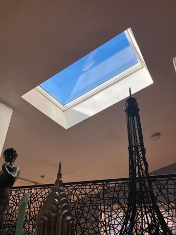 a view of a room with rack on the wall