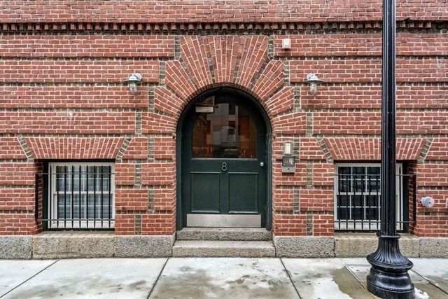 a front view of a house with stairs
