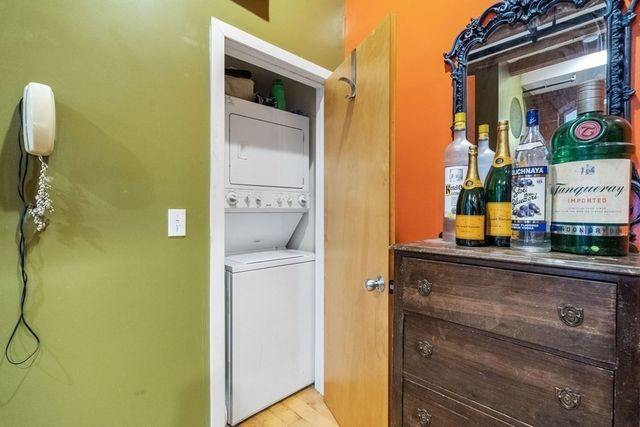 a hallway with mirror on the wall