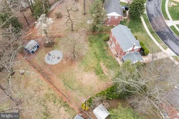 a bathroom with a sink mirror vanity and toilet