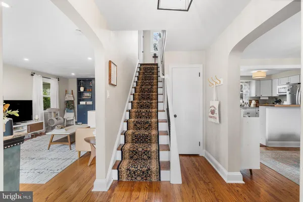 a view of entryway with wooden floor