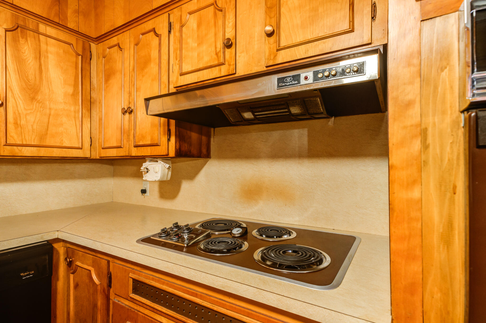 111 East 13th Street Littlefield, TX 79339 - Photo 14 of 38 a kitchen with a stove and a sink