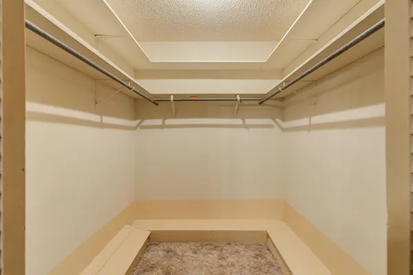 a view of a room with racks on the wall