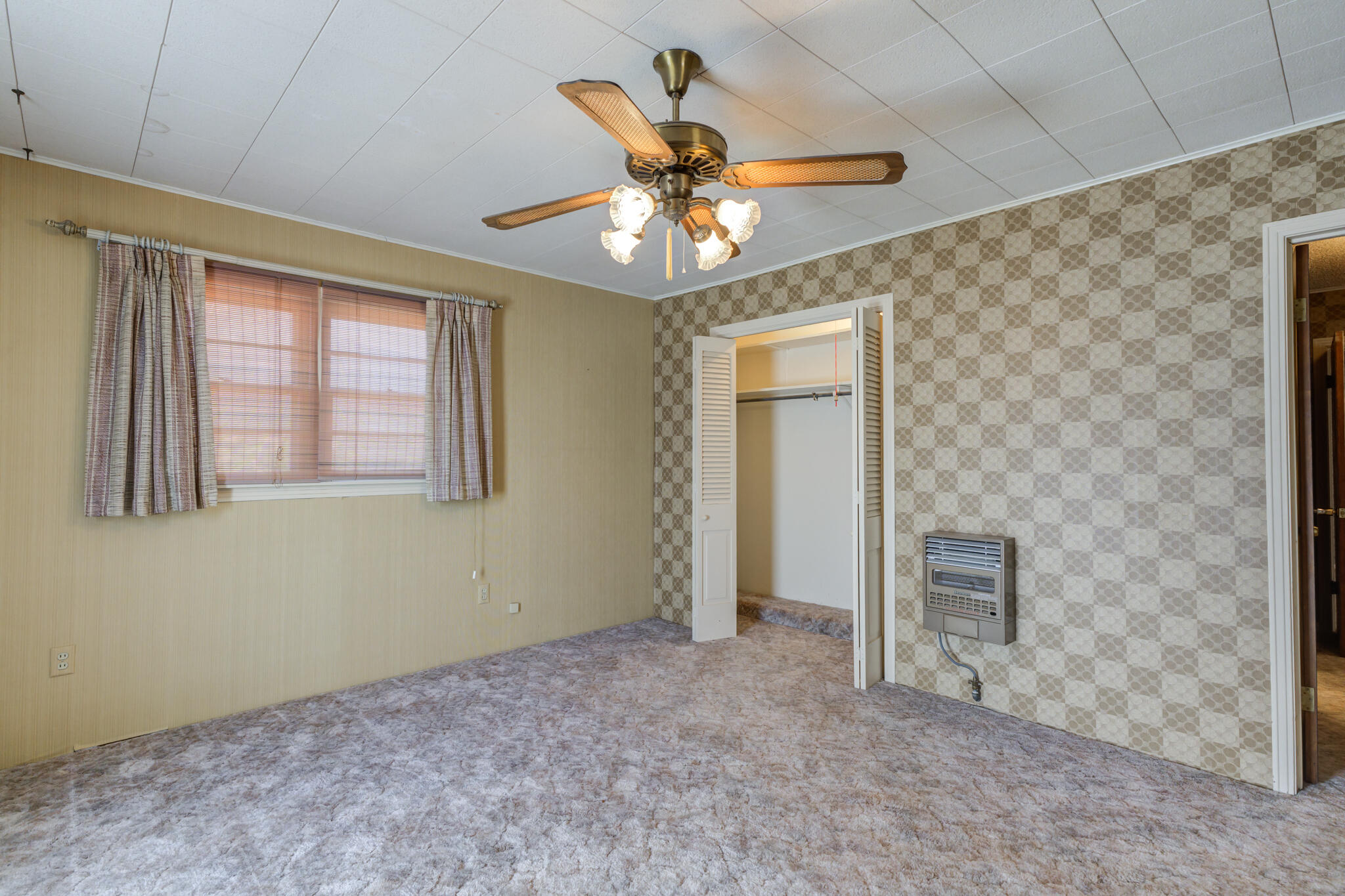 111 East 13th Street Littlefield, TX 79339 - Photo 25 of 38 a view of an empty room with a window