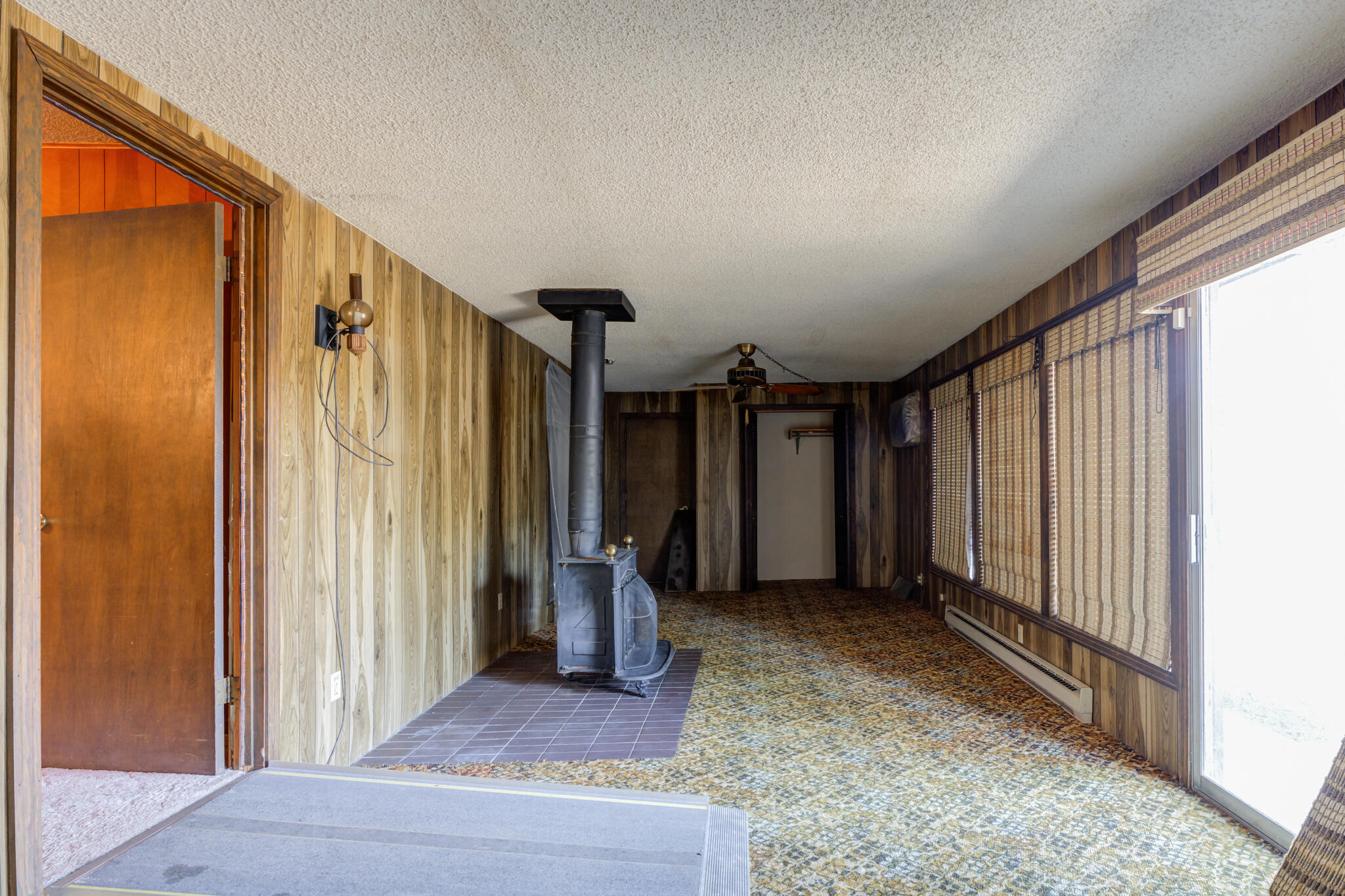 111 East 13th Street Littlefield, TX 79339 - Photo 31 of 38 a view of a porch with wooden floor and stairs