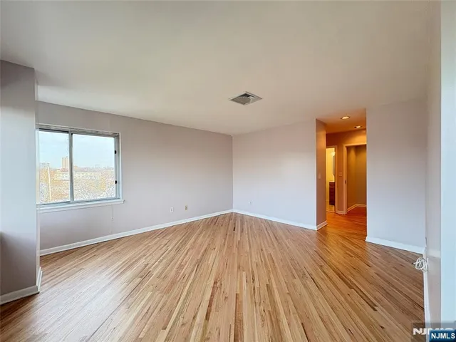 a bathroom with a toilet sink and shower