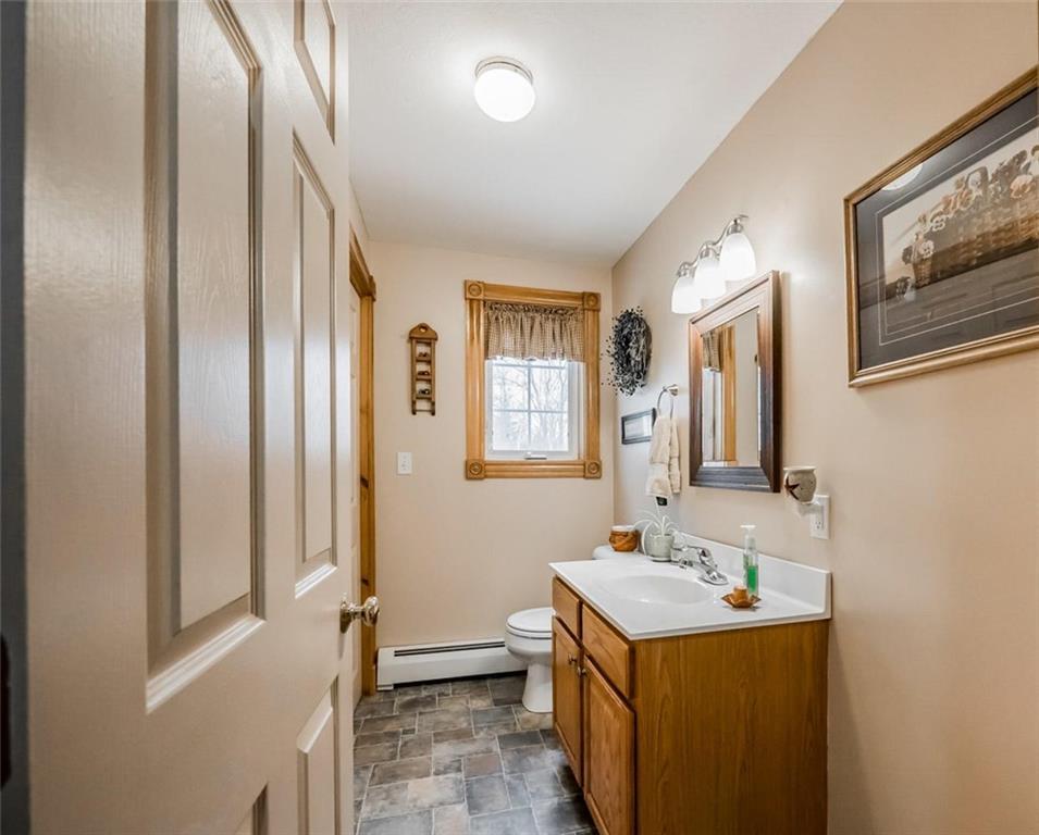 756 West Road Waterboro, ME 04087 - Photo 13 of 30 First floor half bath, featuring...