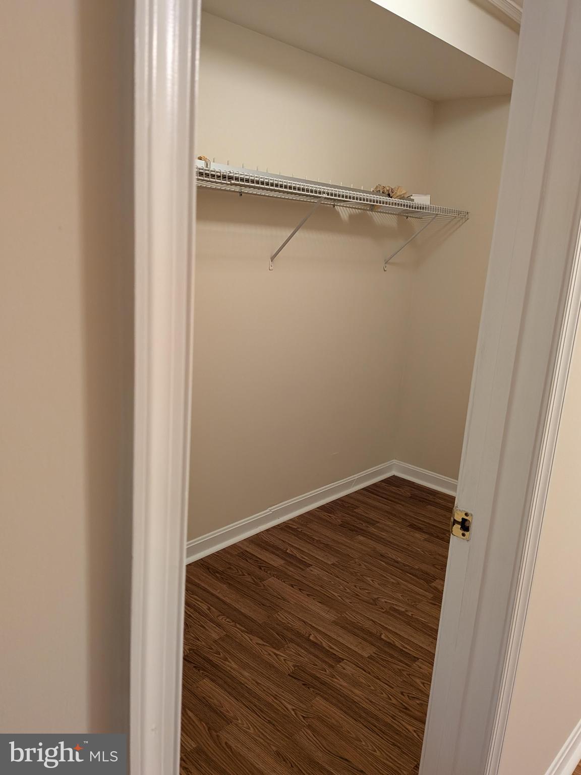 109 Timberbrook Lane, Unit 301 Gaithersburg, MD 20878 - Photo 20 of 22 a view of a room with wooden floor