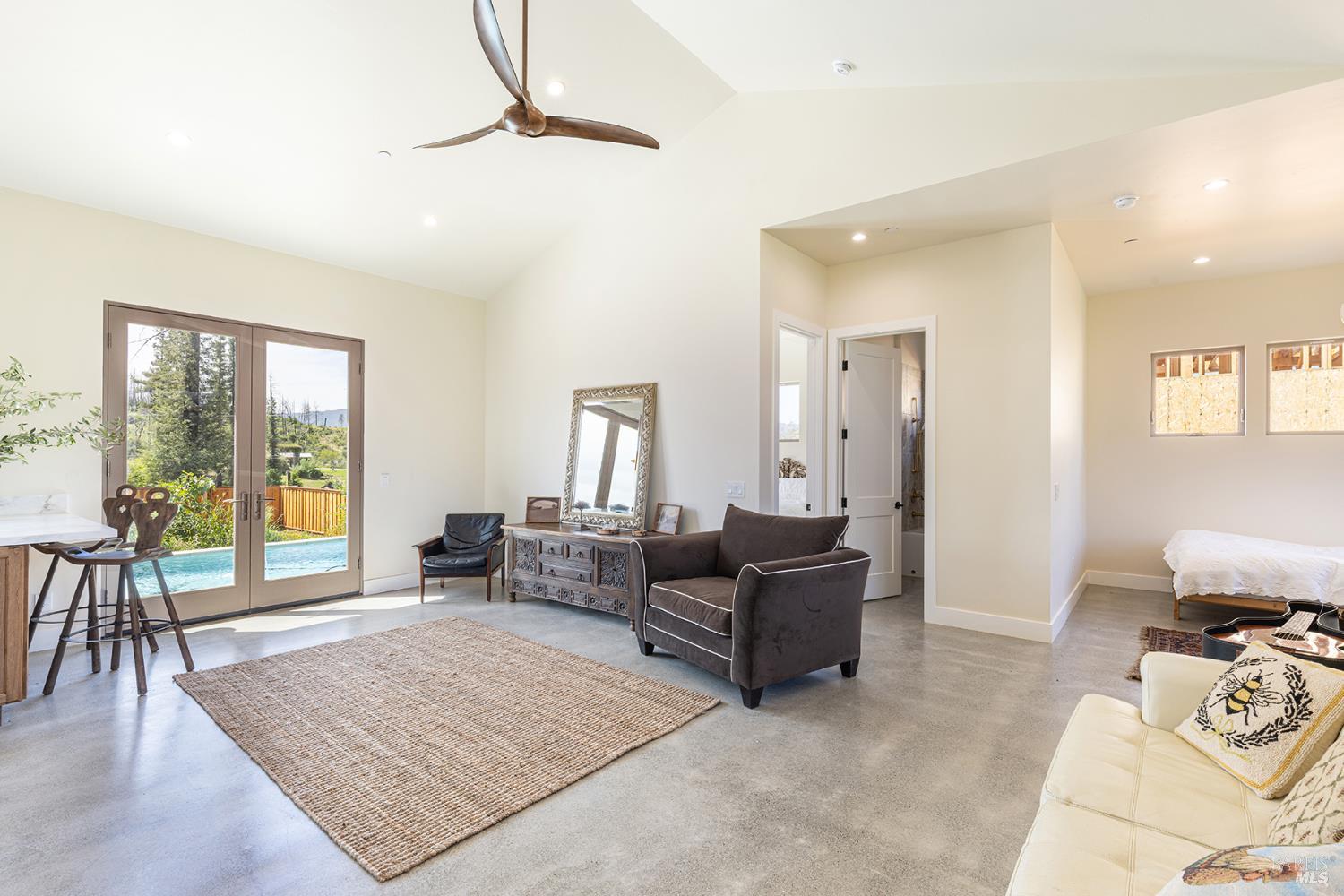 753 Sunnyside Road St. Helena, CA 94574 - Photo 22 of 55 a living room with furniture and a large window