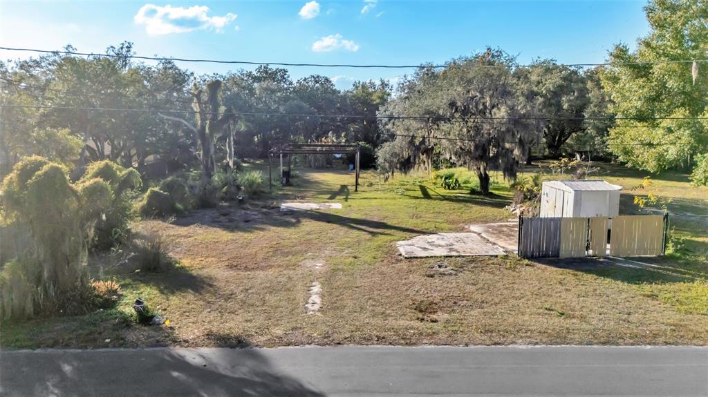 23 Violet Street Plant City, FL 33563 - Photo 2 of 13 a view of a backyard