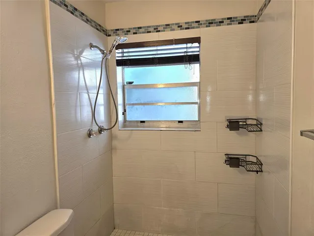 a room with a table and chairs