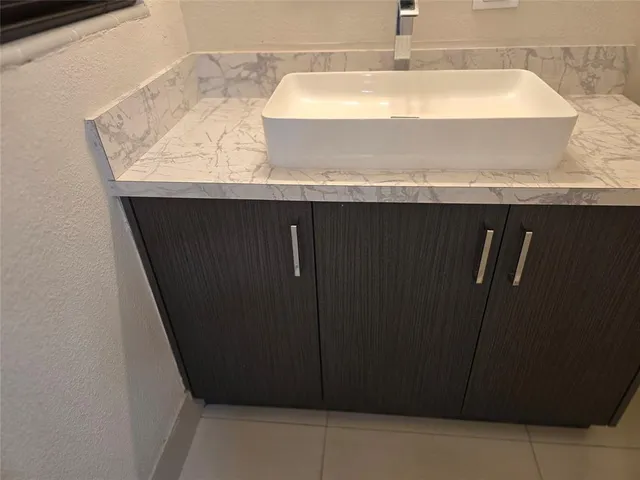 a bathroom with a toilet and shower