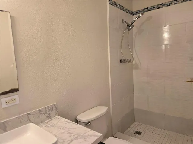 a view of a room that has a window