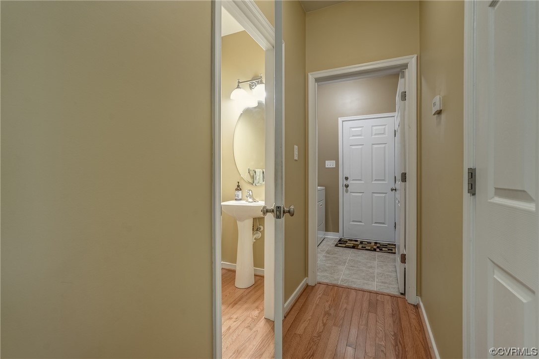 2407 Cascade Meadows Drive Midlothian, VA 23112 - Photo 13 of 48 a view of a bathroom from a hallway