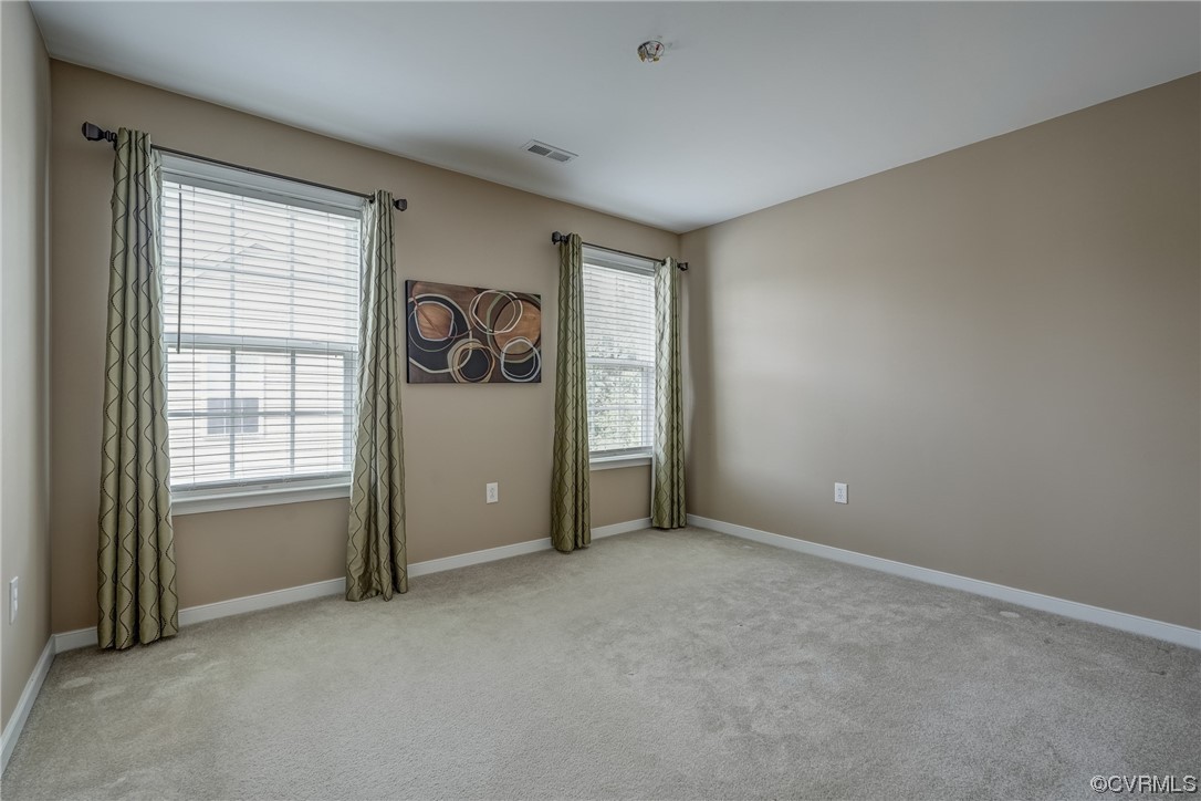 2407 Cascade Meadows Drive Midlothian, VA 23112 - Photo 38 of 48 an empty room with windows