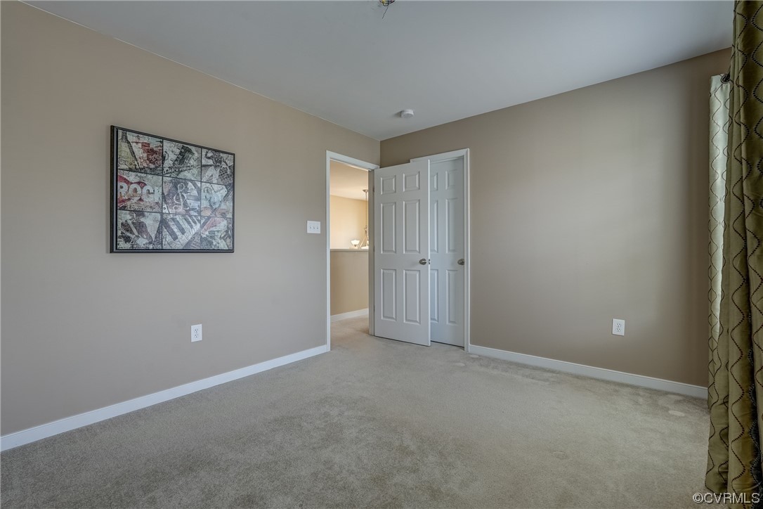 2407 Cascade Meadows Drive Midlothian, VA 23112 - Photo 39 of 48 a view of an empty room with a window