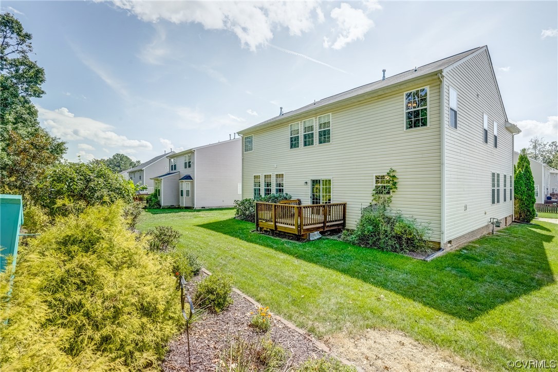 2407 Cascade Meadows Drive Midlothian, VA 23112 - Photo 47 of 48 a view of a house with backyard and sitting area