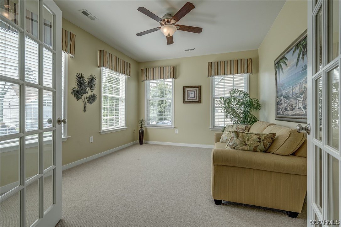 2407 Cascade Meadows Drive Midlothian, VA 23112 - Photo 8 of 48 a living room with furniture and a large window